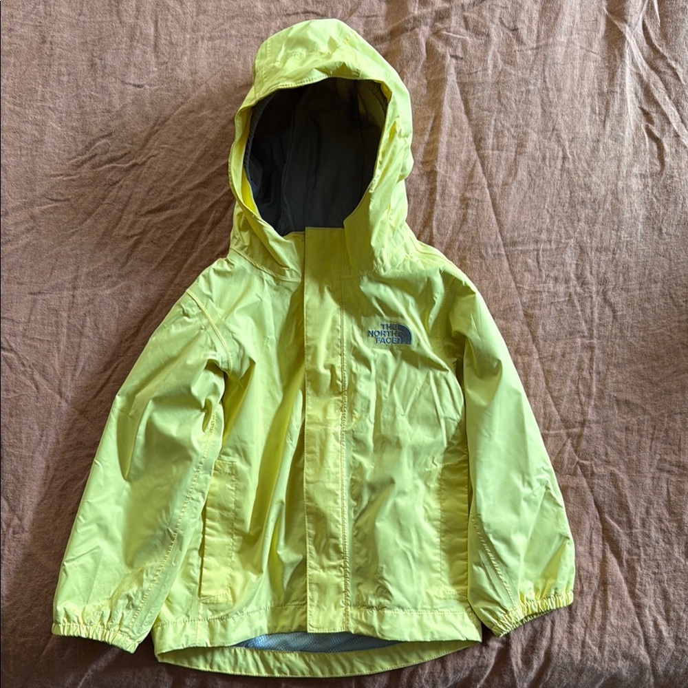 The North Face Yellow Raincoat with Hood and Water-Resistant Material